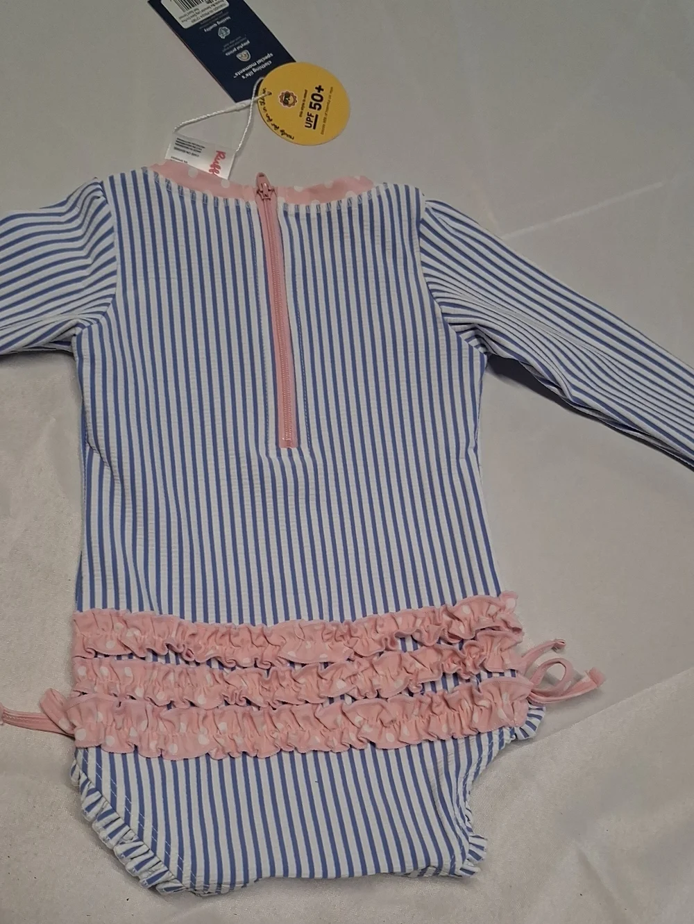 NWT RuffleButts Blue and White Striped Baby Swimsuit with Pink Tag